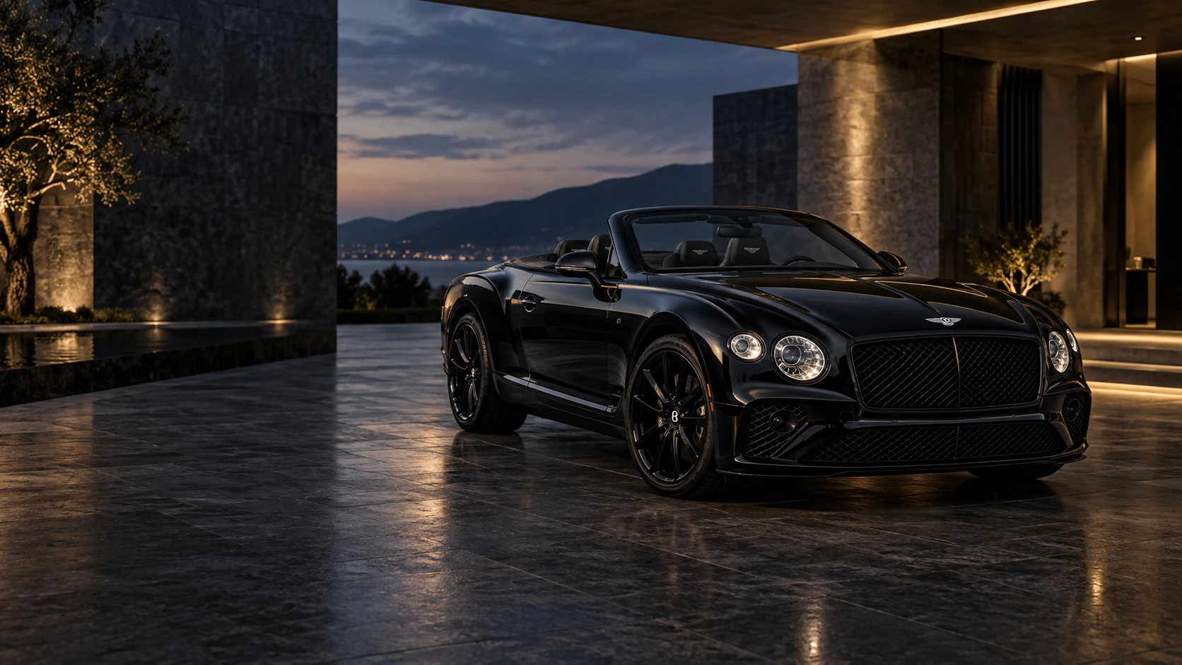 Black Bentley Continental GTC in a dark architectural courtyard